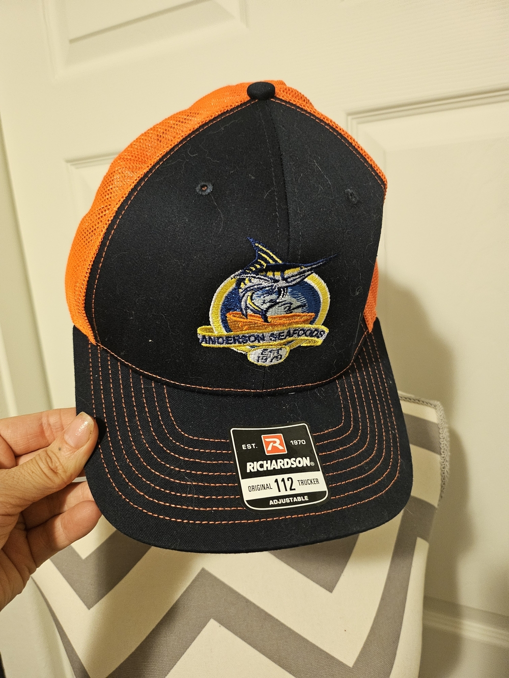 Richardson 112 Trucker Hat with Anderson Seafoods Patch - Black & Orange